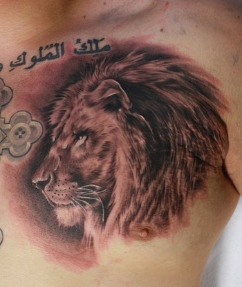 Ty McEwen - lion tattoo 